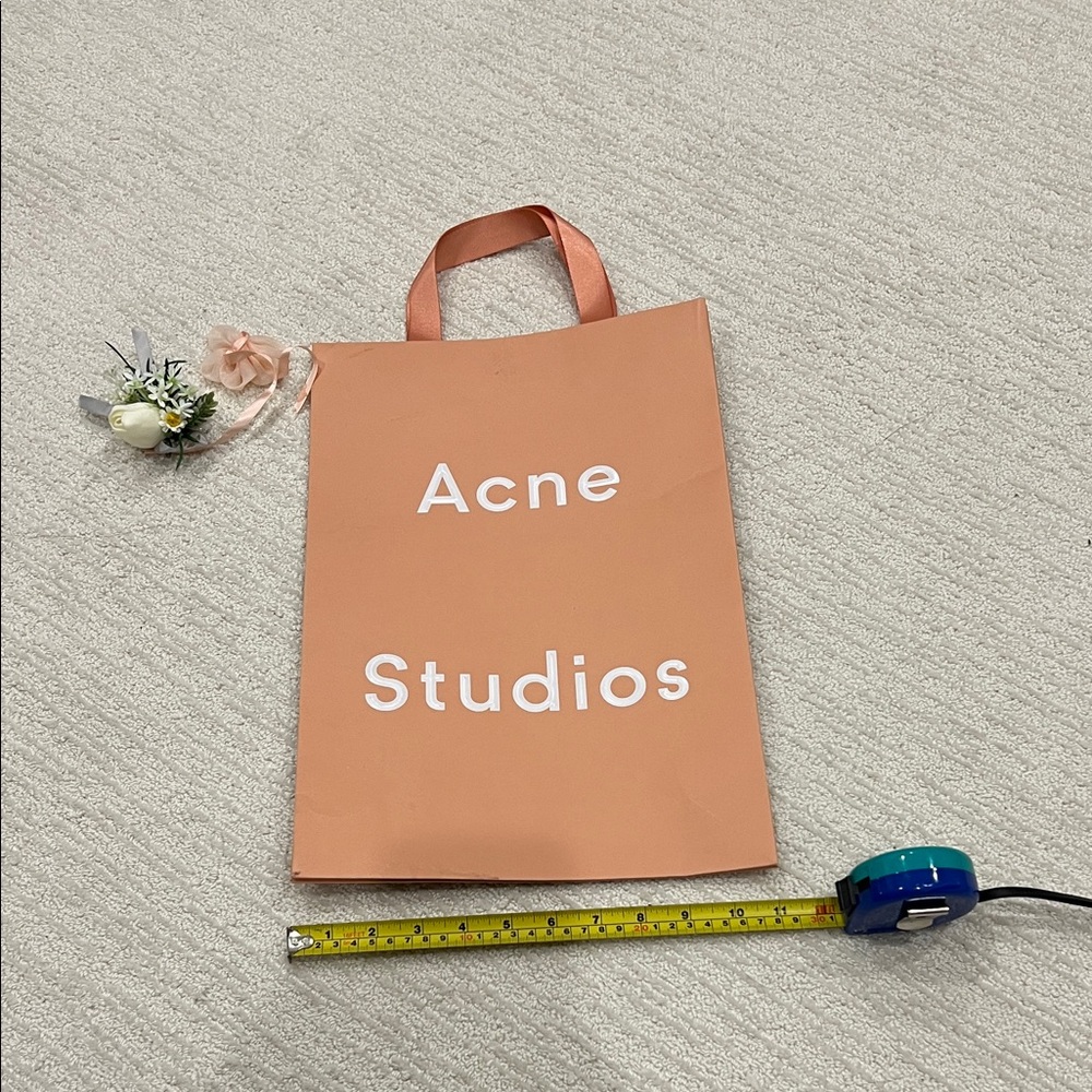 Acne Studios Peach paper shopping bag
